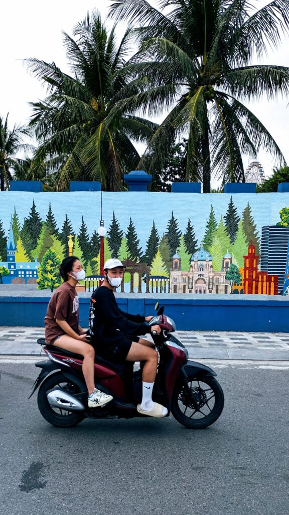 scooter riders in Tay Ho Hanoi